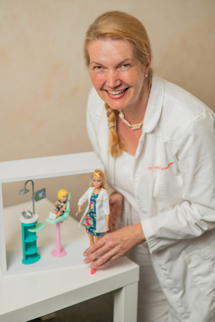 Dr Klostermyer and Barbie at her Dental office
