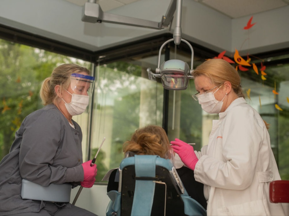 Dr. Ursula Klostermyer Prosthodontist working on a Full Mouth Rehabilitation patient who travel for up to two hours because the quality of care is so high and difficult to find